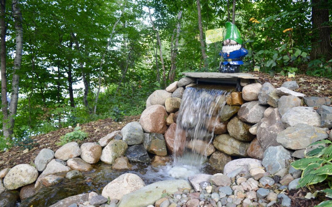 waterfall with garden gnome